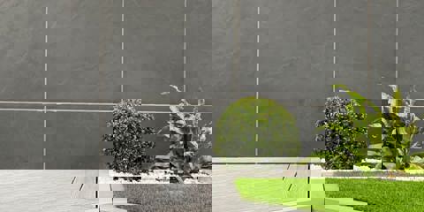 Arrento silver paving laid on wall