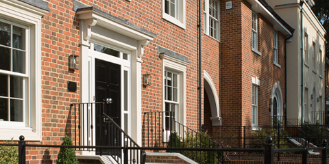 Marshalls cast stone for window surrounds and neo-Georgian porticos