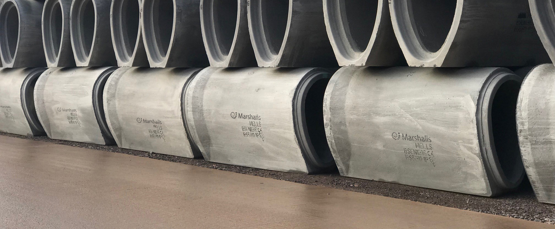 Marshalls ovoid pipes stacked up in the yard