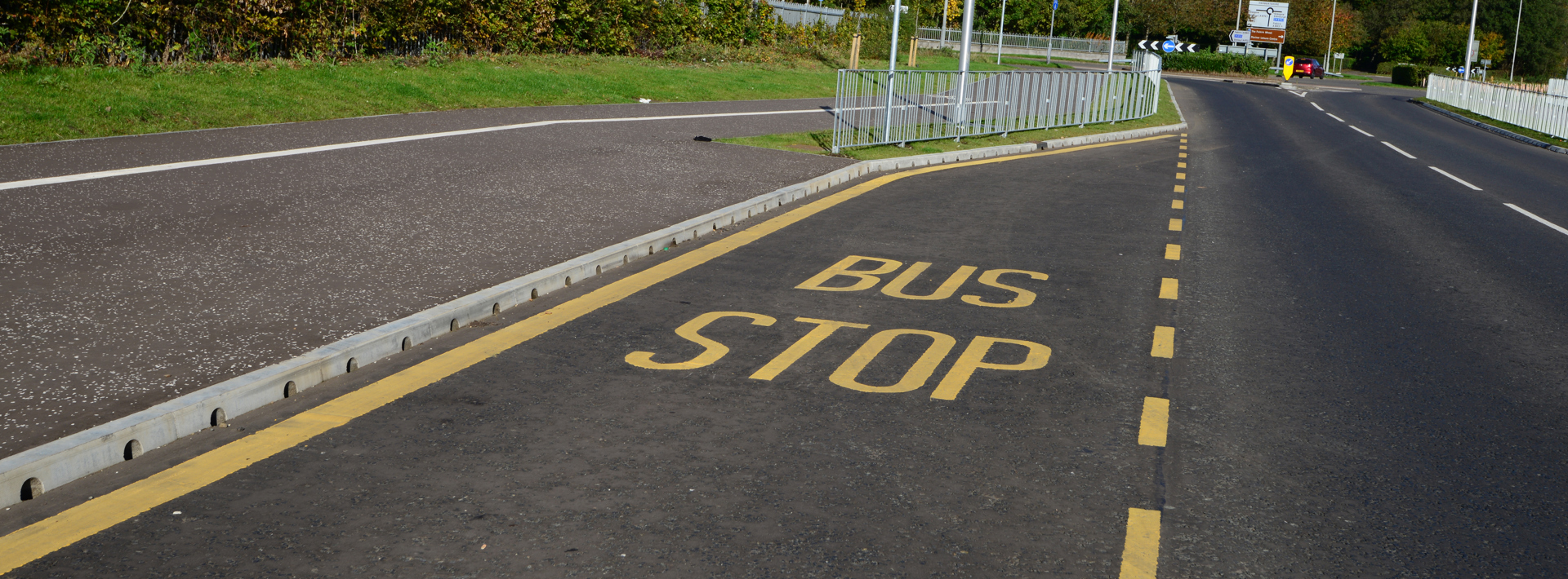 Marshalls Mini Beany used alongside a road as part of the bus stop