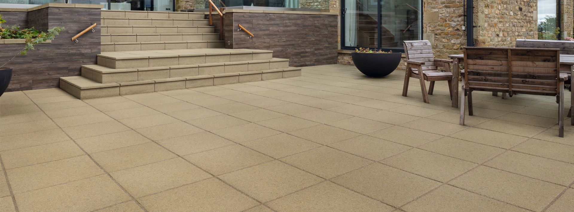 Marshalls Saxon paving in buff laid in a garden