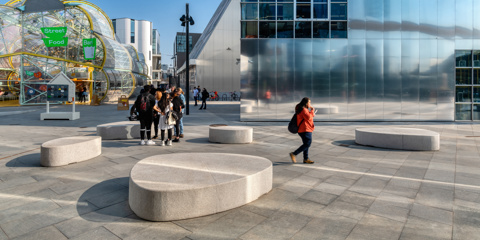 Greenwich design district with seating and people walking around