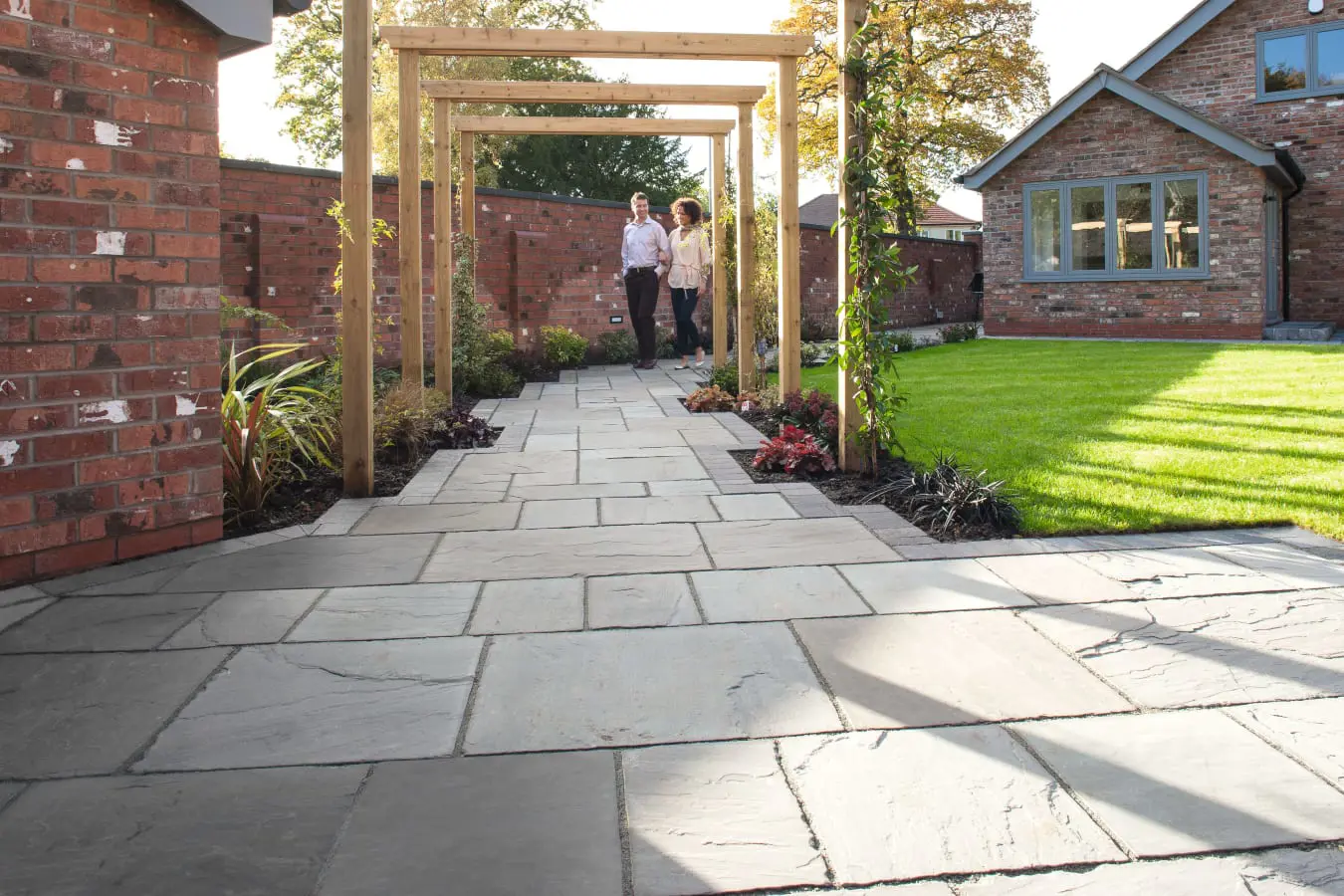 Marshalls Antique Alverno in silver birch laid on a pathway with two people walking along it