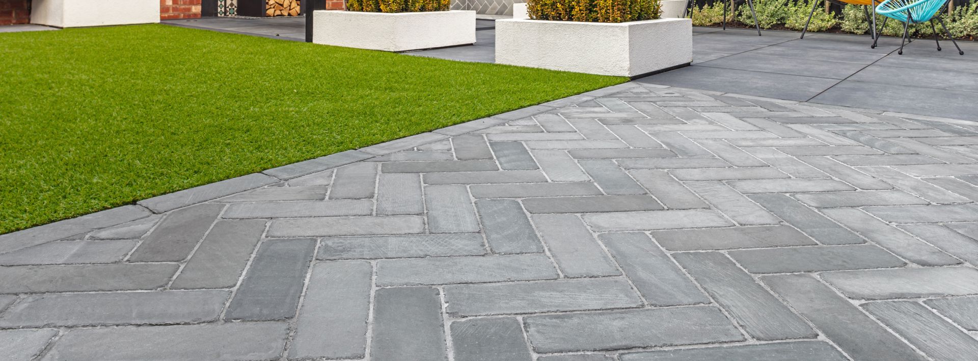 Marshalls silver blend alvanley pavers laid in a garden