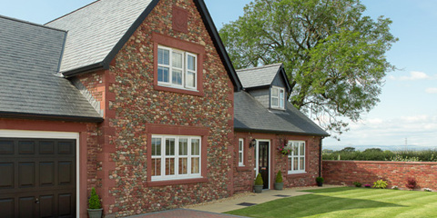 Urban village of 3 and 4 bedroom family houses featuring cast stone