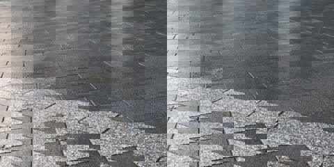 Marshalls Sawn Granite Setts on a driveway in front of a modern white house