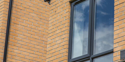 Facing bricks creating the external wall of a house