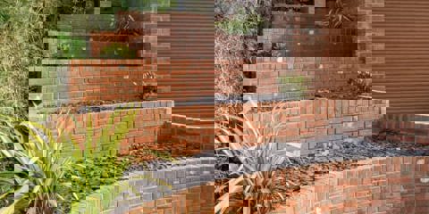 Five curved walls using Marshalls old mill bricks
