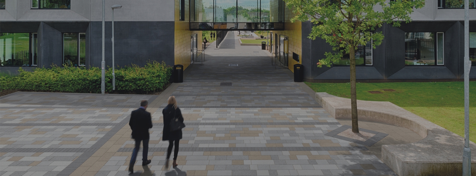 People walking on marshalls paving